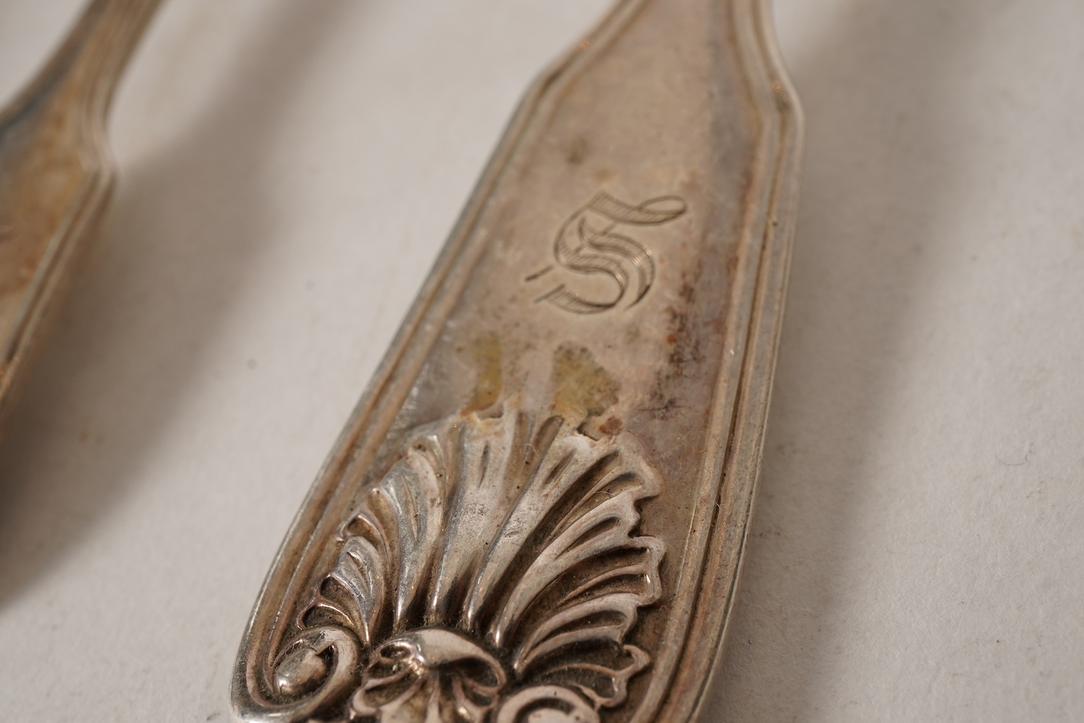 A matched part canteen of mainly 19th century silver double struck fiddle, thread and shell pattern flatware for twelve